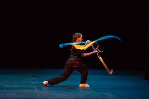 Michaela, demonstrating shuānggōu at the Chinese New Year Celebration; photo by Daniel Madison.